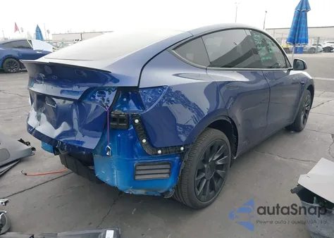 2025 Tesla Model Y Long Range Dual Motor Rear-Wheel Drive z USA, uszkodzony, nr VIN 7SAYGDED7SF309635